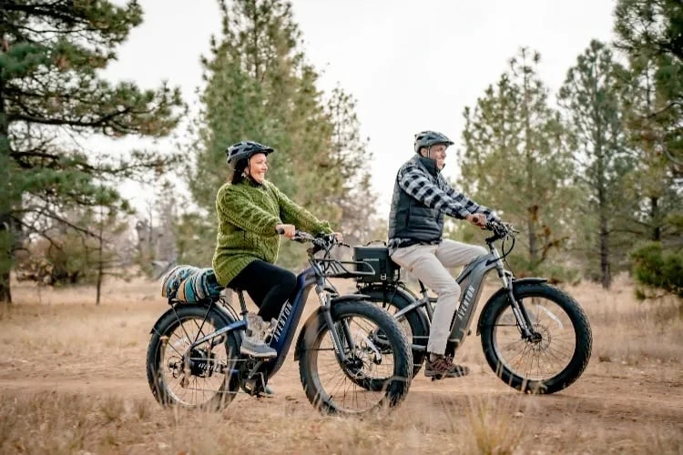 Couple riding electric bikes rented at Big Bear Bike Rentals