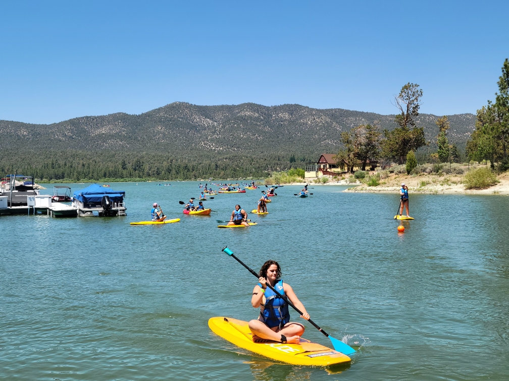 Scenic Big Bear kayak launch with paddleboards and kayaks on Big Bear Lake