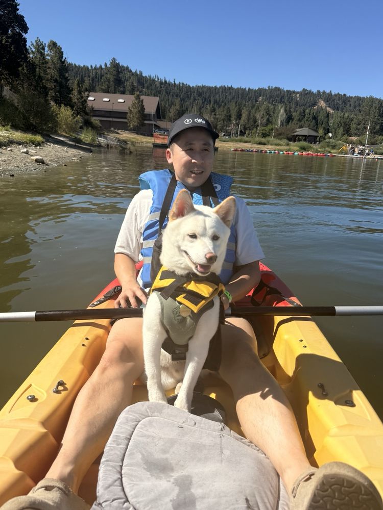 Person and dog on tandem kayak in Big Bear Lake